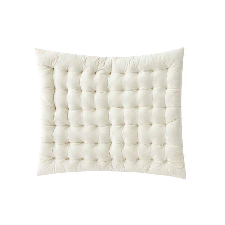 a white pillow on a white background