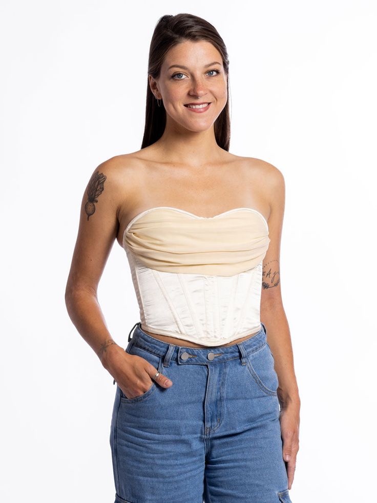 Get prepped for a flirty night out in our ivory satin with chiffon draped cowl neck corset top. 💋 Crafted from a silky woven fabric, this corset inspired top is complete with lace-up back detail, a cowl neckline, and a cropped fit with a curved hem. Finished with boning and removeable, adjustable straps. 100% Satisfaction Guarantee Outer Fabric 100% premium polyester 100% cotton lining Dry clean only Chiffon draped neckline Satin body Side zip closure Back Lace up adjustment Boned bodice Remove Cowl Neck Corset, Chiffon Corset, Orchard Corset, Cute Corset, Neck Corset, College Outfit, Boned Bodice, Draped Neckline, Cowl Neckline