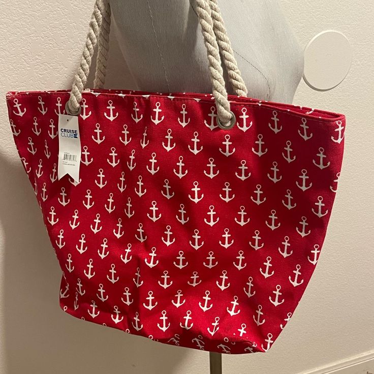 This Is A New Red Canvas Anchor Design "Cruise Club" Travel Beach Tote Bag. The Tote Bag Has Rope Straps As The Handles And Are Very Lightweight. The Tote Bag Measures About 22 Inches Wide And About 13 Inches Long. Please Zoom Into The Pictures Of The Red Anchor Themed Tote Bag To See The Great Condition Of The Tote Bag. If You Have Any Questions Or Concerns, Please Don't Hesitate To Contact Me Prior To Purchase To Ensure The Red And Off-White Anchor Themed Tote Bag Are A Perfect Addition To You Trendy Red Canvas Bag For Travel, Trendy Red Canvas Bag For Shopping, Trendy Red Beach Bag With Large Capacity, Trendy Large Capacity Red Beach Bag, Red Large Capacity Bag For Summer, Large Capacity Red Bags For Summer, Red Large Capacity Beach Bag For Vacation, Large Capacity Red Beach Bag For Vacation, Large Capacity Red Beach Bag For Travel