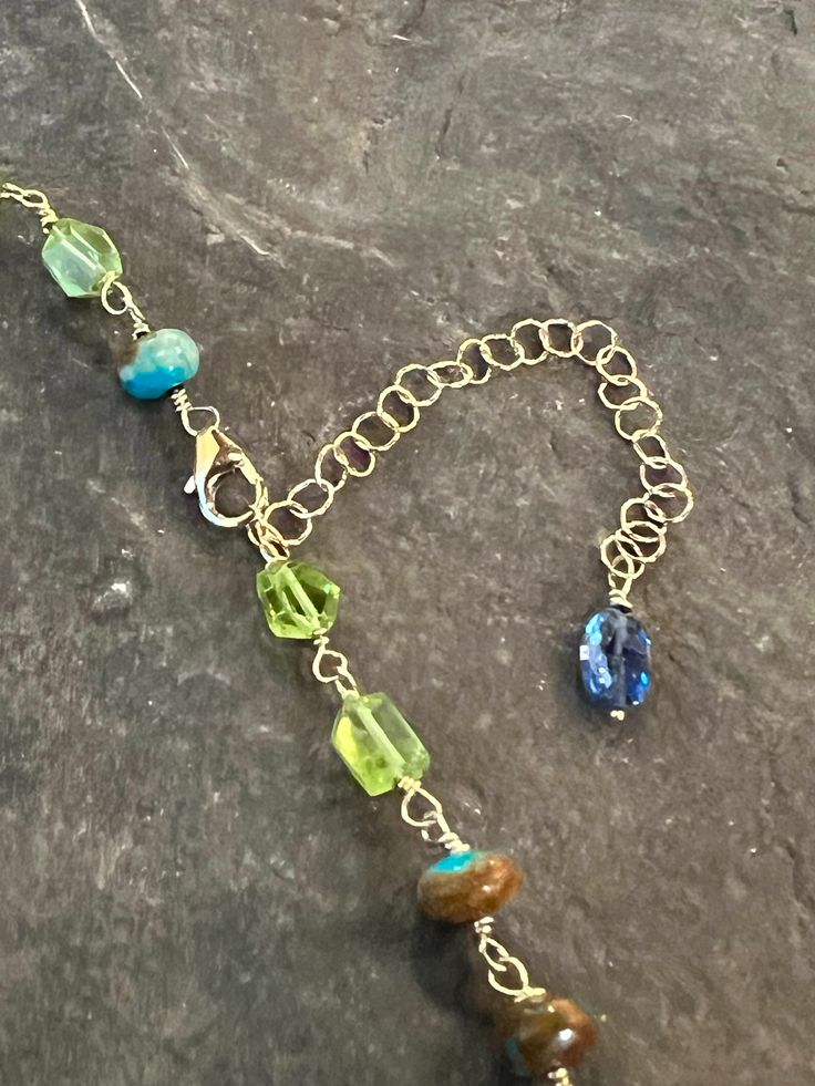 Lush blues and greens in 14K yellow gold with top quality Arizona Turquoise, Kyanite (deep blue), Peridot, Tahitian Keishi pearl and South Sea Keishi pearl Length is 16” - 19” 14k lobster clasp Center Kyanite is approx 10 mm x 7 mm Average Peridot size is approx 6 mm x 4.5 mm Blues And Greens, Arizona Turquoise, South Seas, Turquoise Water, Deep Blue, Jewelry Ideas, Lobster Clasp, Lush, Arizona