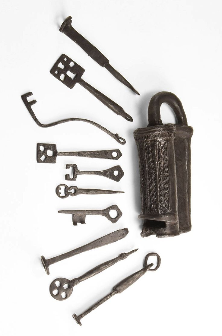 an assortment of tools are displayed on a white surface