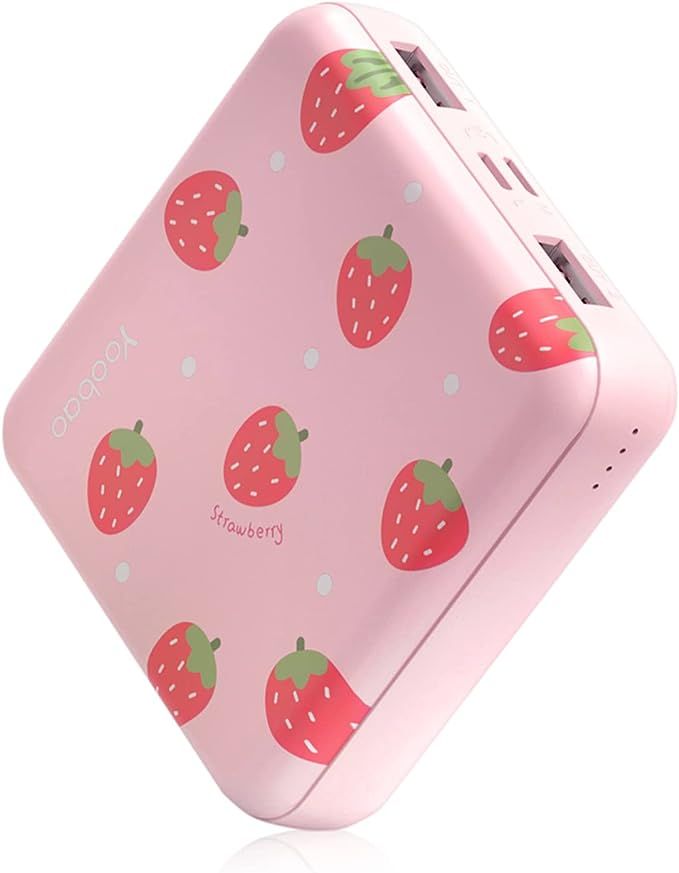 a pink portable charger with strawberries on it