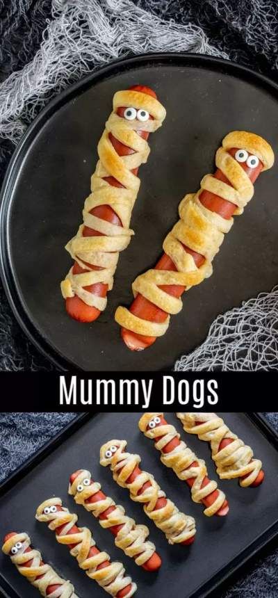 an assortment of hotdogs wrapped in bacon with eyes and noses on them, sitting on a black plate