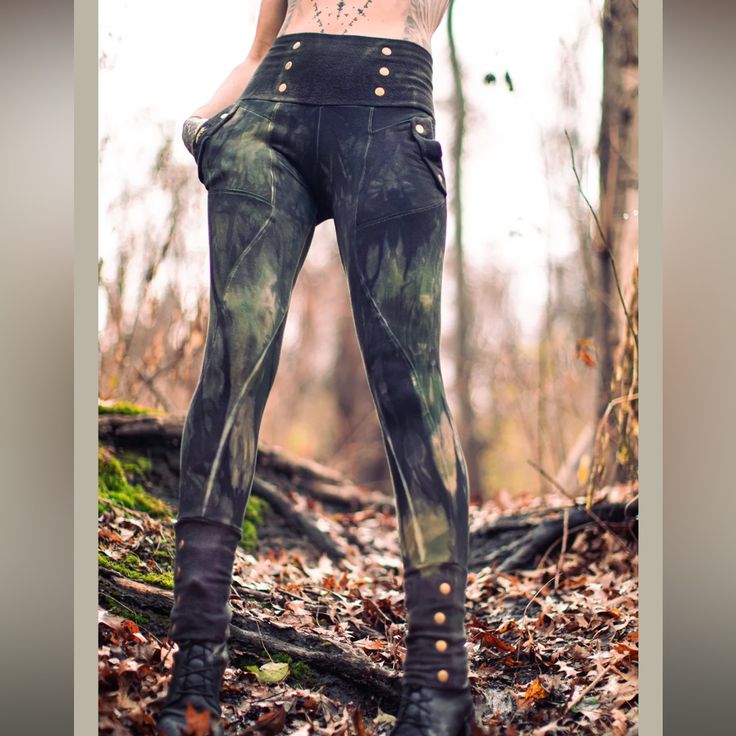 Battalion Militia Trouser Leggings By Crossfox Size Xs Hand Dyed Shades Of Moody Deep Green And Black, Fleece Lined And So Soft And Cozy, Antique Brass Rivets Colors Are A Little Different From The Listing Photos Because The Artist Is Modeling A Different Size, But This Pair Is From The Same Listing From December 2022 Original Price Paid $245 Plus Shipping. I Love These And Wish I Liked The Fit Of The Style But It’s Not Great On Me Through The Hips. Only Tried On And Never Worn. No Flaws! Price Military Style Fitted Bottoms For Streetwear, Fitted Military Style Bottoms For Streetwear, Fitted Alternative Pants For Fall, Fitted Alternative Style Pants For Fall, Fitted Military Style Pants For Streetwear, Fitted High Waist Punk Cargo Pants, Fitted Full-length Bottoms For Alternative Fashion, Fitted High Rise Punk Bottoms, Edgy Fitted Cargo Pants For Fall