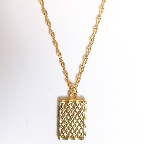 Gold rectangular textured charm necklace, Vintage rectangular textured charm, minimalist jewelry, gold plated brass chain, gift for herA beautiful figure 8 chain, 16K gold plated brass chain, tarnish resistant and nickel free. The textured rectangular pendant measures 27x19mm, 2mm thick.Can be worn everyday. Perfect for layering , it can be dress up or down.The necklace is 18inches long + 2 inches extender chain. Elegant Rectangular Brass Necklace, Minimalist Gold-tone Rectangular Jewelry, Gold Textured Jewelry For Gifts, Textured Gold Jewelry Gift, Textured Gold Jewelry For Gifts, Everyday Rectangular Gold Chain Necklace, Gold Plated Tarnish Resistant Chain Necklace With Rectangular Pendant, Rectangular Chain Necklace For Gift, Dainty Rectangular Necklaces With Delicate Chain