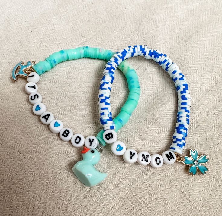 This blue gender reveal bracelet is a sweet and simple accessory that's all about celebrating a baby boy. It's a dainty bracelet adorned with various shades of blue beads, creating a lovely and unique look. It's the perfect way to share the exciting news of your baby's gender with a touch of elegance.