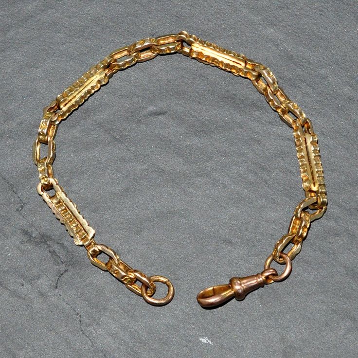 9ct Yellow gold fancy link 'watch chain' bracelet. This chain was part of an antique watch chain, circa 1900. Clasp added in recent years.  Weight   13.5 grams Length of chain 21.5 cm Each and every piece listed by Vintage Fine Jewellery has been restored by hand in our London workshop by highly skilled jewellers. Our jewellers use the same expertise to restore a piece of jewellery, as used in their creation many years ago. If you would like to see more of the Vintage Fine Jewellery Collection, Antique Gold Rectangular Bracelet, Antique Hallmarked Chain Bracelet For Formal Occasions, Antique Gold Bracelet With Lobster Clasp, Vintage 14k Gold Chain Link Bracelet, Antique Yellow Gold Link Bracelet, Vintage Yellow Gold Bracelet With Rectangular Links, Engraved Oval Link Yellow Gold Bracelet, Engraved Link Yellow Gold Bracelet, Engraved Yellow Gold Link Bracelet