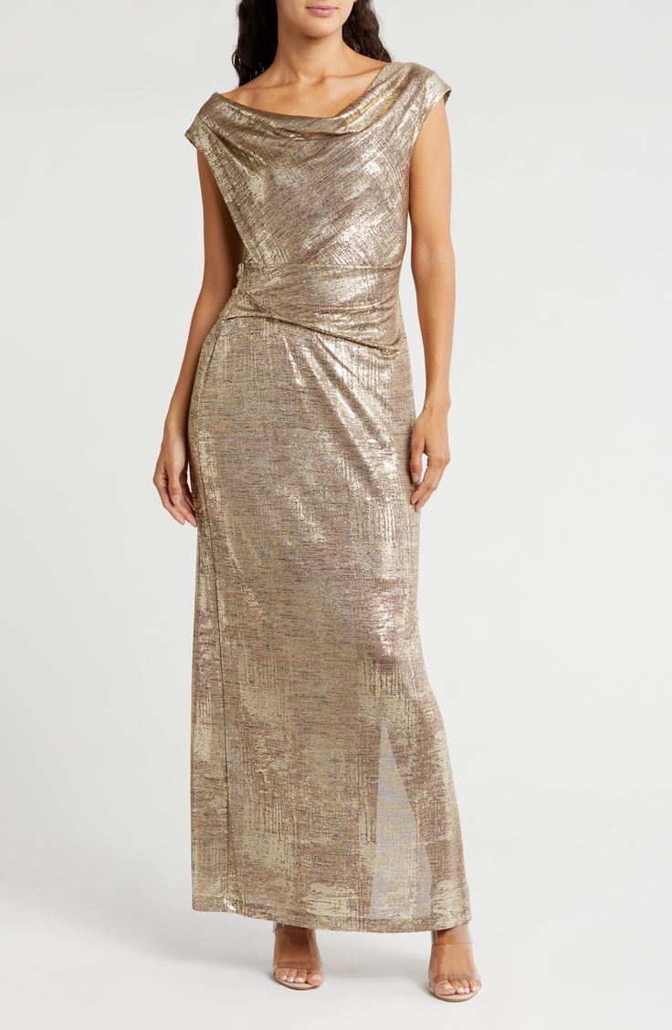 Show off captivating shine in this foiled jersey dress fashioned with a elegantly draped cowl neck and gracefully gathered waist. 58" length Slips on over head Cowl neck Sleeveless Lined 95% polyester, 5% spandex Hand wash, dry flat Imported Sparkly Cowl Neck Dress, Glamorous Fitted Cowl Neck Dresses, Cowl Neck Dress Gold, Luxury Cowl Neck Evening Dress, Luxury Cowl Neck Evening Maxi Dress, Sleeveless Gown, Daytime Dresses, Sweaters And Leggings, Comfortable Dress