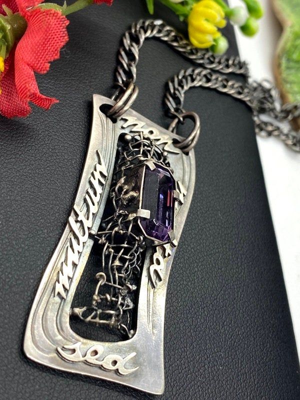 "ARTISAN AMETHYST PENDANT Hand-made Sterling Silver. Stones used: Amethyst. Height - 2\", Width - 7/8\" Chain - 22\" Unique Handcrafted One-of a-kind Design Pendant. Each Piece of Jewelry in my Collection is One of a kind. When you start wearing a piece of my jewelry you will fall in love with it more and more each day and feel that good energy that I pass into it while creating this piece of Art. I use only natural unique stones and unique technics creating my jewelry. You will be the only pers One-of-a-kind Amethyst Jewelry As Gift, One Of A Kind Amethyst Jewelry Gift, Purple Engraved Sterling Silver Necklace, Engraved Sterling Silver Purple Necklace, Engraved Purple Sterling Silver Jewelry, Engraved Purple Sterling Silver Necklace, Collectible Amethyst Pendant Jewelry, One Of A Kind Silver Amethyst Jewelry, Unique Jewelry With Large Purple Pendant