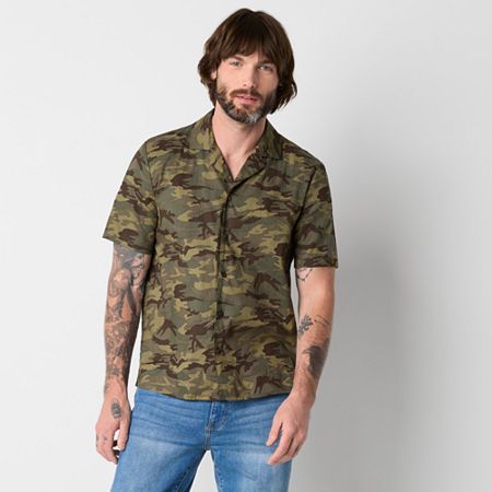 This men's camo-print camp shirt adds a cool laidback twist on a classic from the new Walker Hayes for JCPenney collaboration - a stylish modern collection rooted in feel-good, homegrown vibes and the hit-making swagger of the singer himself. Crafted from 100% cotton that's easy to care for, this short-sleeve shirt is cut for a classic-fit with a notch collar and a button-front closure. Wear yours with jeans or chino shorts from the range for a total VIP look and feel. Features: Easy CareClosure Khaki Collared Camp Shirt For Outdoors, Casual Khaki Camp Shirt With Camp Collar, Casual Camouflage Shirt For Outdoor, Khaki Camp Shirt With Relaxed Fit, Green Camp Collar Top For Outdoor, Green Casual Camp Shirt For Outdoor, Casual Camouflage Shirt For Summer, Casual Camouflage Short Sleeve Shirt, Khaki Camp Shirt With Relaxed Fit And Camp Collar