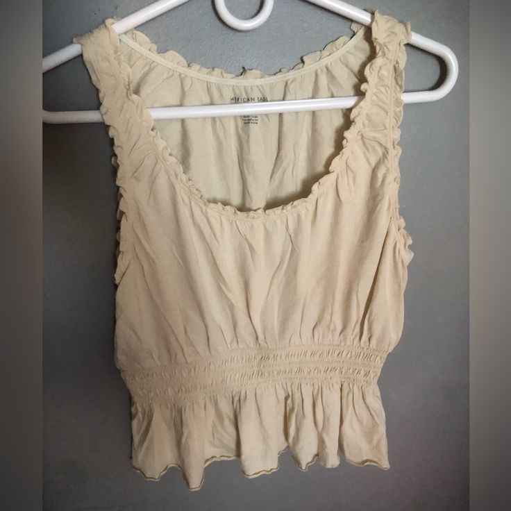 White/Cream Ruffled Blouse From American Eagle. Fitted Around The Waist, Then Slightly Flares Out. Never Worn Before. New Without Tag. True To Size Bear Aesthetic, Ruffled Blouse, White Cream, Cream White, White Tops, American Eagle Outfitters, American Eagle, Ruffle Blouse, Womens Tops