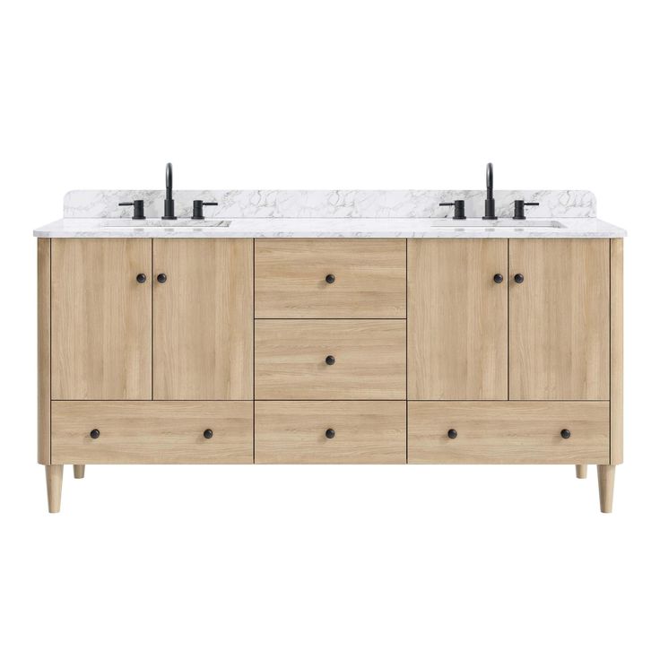 the double sink vanity has two black faucets on each side and marble top