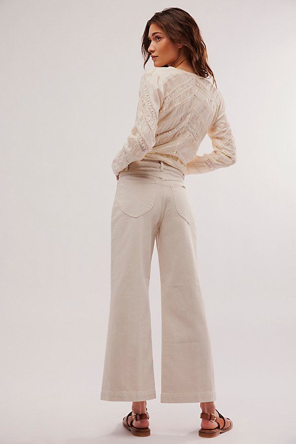 High-waisted jeans featured in a wide-leg silhouette. * Authentic denim * Front and back patch pockets * Button closure and zip fly | Rolla’s Sailor Jeans by Rolla's at Free People in White, Size: 26 Beige Wide Leg Flare Jeans For Fall, Wide Leg Flare Jeans With Patch Pockets For Fall, Beige Wide Leg Flare Jeans For Work, Wide Leg Flare Jeans In Beige With Five Pockets, Beige Flare Jeans With Pockets For Spring, Spring Beige Flare Jeans With Pockets, Spring Workwear Beige Flare Jeans, Chic Wide Leg Jeans With Patch Pockets, Chic Spring Jeans With Patch Pockets