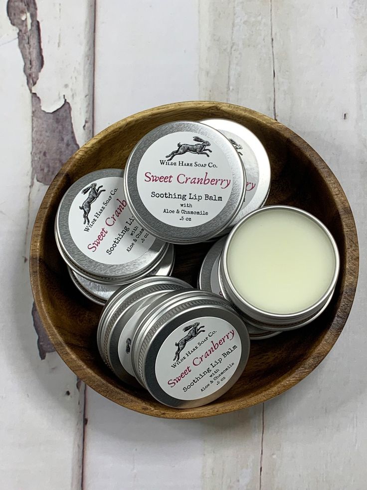 Tart, sweet classic cranberry. Not too soft. Not too waxy. Not sticky, slick, or grainy, Wilde Hare's Soothing Lip balm features a host of lip-loving ingredients including cocoa butter, avocado, sunflower and grapeseed oils, aloe, chamomile, and vitamin e that will leave lips feeling moisturized and nourished. Each screw-top tin features 0.5 oz of our proprietary lipbalm blended with just the right amount of tasty flavor.  Listing is for one .5 oz lip balm tin. Ingredients: Cocoa Butter, Beeswax, Soy Wax, Coconut Oil, Sunflower Seed Oil, Avocado Oil, Castor Seed Oil, Grape Seed Oil, Flavor, Sweet Almond Oil, Aloe Extract, Chamomile Extract, Vitamin E. Elderberry Lip Balm, Tallow Lip Balm, Fresh Sugar Lip Balm Cherry, Essential Oil Lip Balm Tin, Baking Soda Free Deodorant, Cherry Lip Balm, Peach Lip Balm, Diy Lip Balm Recipes, Lip Balm Tin