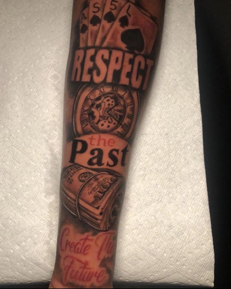 a man's arm with the words respect and an image of playing cards on it