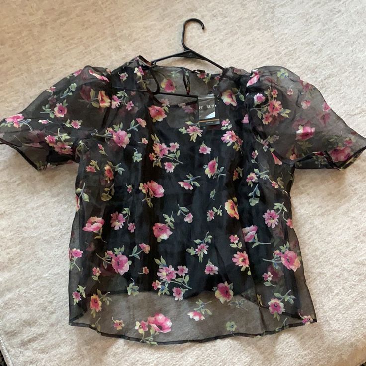 Forever 21 Brand Black With Pink Floral Details Sheer Top In A Size 2x Has Puffy Fit On Shoulder Comes With A Under Shirt Brand New With Tags Floral Spring Tops For Night Out, Floral Print Summer Tops For Night Out, Summer Floral Print Blouse For Night Out, Forever 21 Short Sleeve Blouse For Day Out, Forever 21 Tops For Spring Night Out, Forever 21 Tops For Night Out In Spring, Forever 21 Black Floral Print Top, Forever 21 Casual Floral Print Blouse, Forever 21 Black Short Sleeve Top