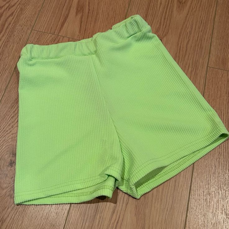 Lime Green Shorts From Prettylittlething Trendy Solid Color Summer Shorts, Green Bottoms With Built-in Shorts For Spring, Trendy Green Vacation Shorts, Trendy Green Shorts For Beach, Trendy Green Shorts For The Beach, Trendy Green Shorts For Vacation, Green Short Bottoms For Summer, Spring Green Bottoms With Built-in Shorts, Playful High-waisted Shorts For Summer