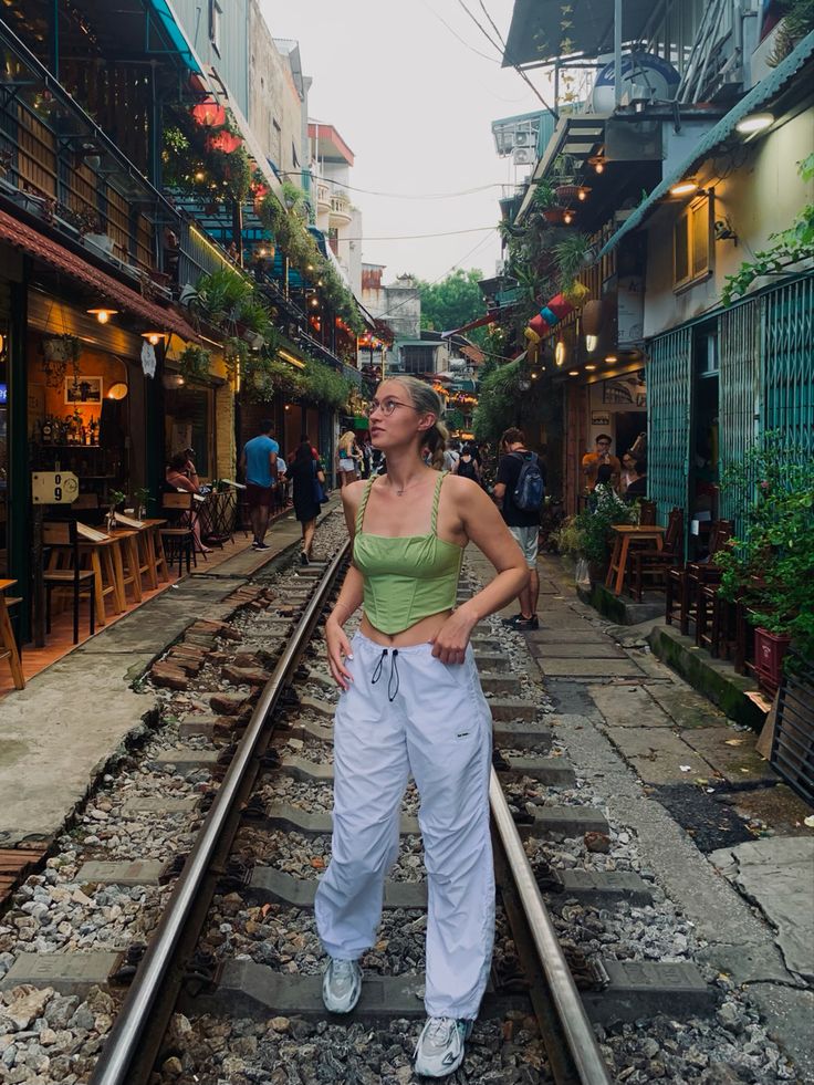 Train Street Hanoi
Train tracks
Vietnam Asian Travel Outfit, Sapa Vietnam Outfit Idea, Hanoi Vietnam Outfit, Vietnam Photo Poses, Vietnam Train Street, Taiwan Aesthetic Outfit, Travel Outfit Vietnam, Vietnam Fashion Street, Vietnam Photoshoot Ideas