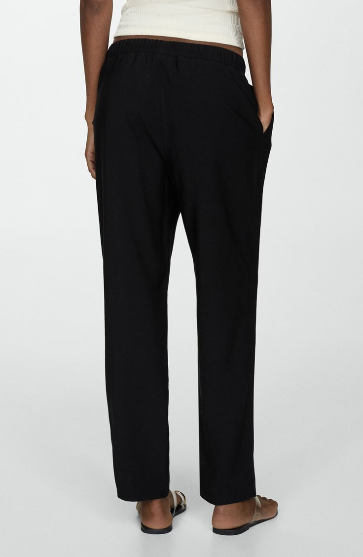 Look put-together but stay comfy in these flowy, high-rise, jogger-style trousers made with an elastic waist and relaxed straight legs. Elastic/drawstring waist Side slant pockets 93% viscose, 7% polyester Machine wash, line dry Imported Viscose Bottoms With Elastic Waistband And Tapered Leg, Chic Tapered Leg Sweatpants For Loungewear, Chic Joggers With Elastic Waistband For Loungewear, Chic Elastane Sweatpants For Loungewear, Chic Joggers For Loungewear, Viscose Ankle-length Loungewear Pants, Ankle-length Viscose Pants For Loungewear, Black Ankle-length Joggers For Work, Viscose Ankle-length Lounge Pants