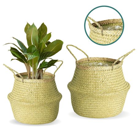 two woven baskets with plants in them