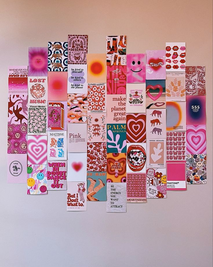 a wall covered in lots of different types of stickers