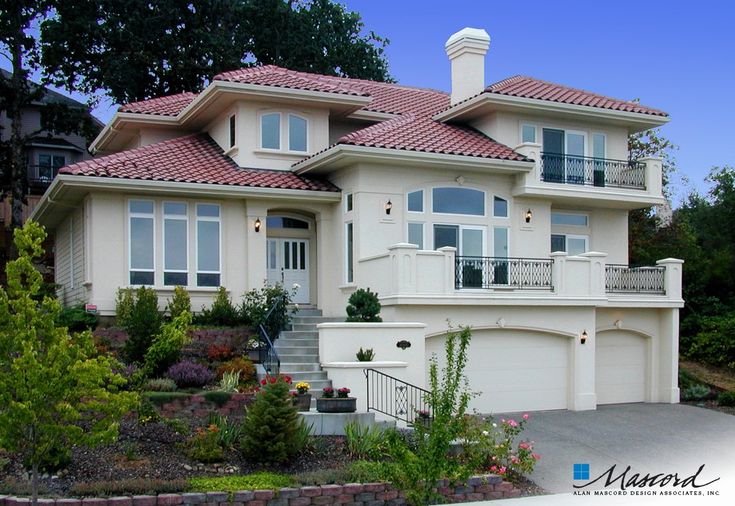 a large white house with lots of windows