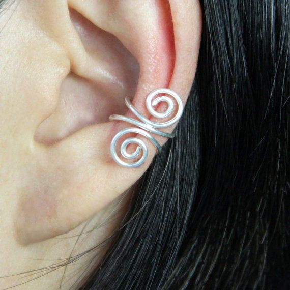 "This unique ear cuff is handmade using sterling silver, or copper. Free US shipping. Customers who purchase this item said: \"Lovely ear cuffs. I look forward to giving these to my daughter as a birthday present. Thank you! \" \" I love everything very much!\" The price include one piece of the ear cuff. If you need a pair, please order two pieces. ;-) Enter my shop here: http://www.etsy.com/shop/AniDesignsllc?ref=pr_shop_more ;-) My contact number: 626-379-1904. Please contact me if you would Unique Ear Cuffs, Diy Friendship Bracelets Tutorial, Friendship Bracelets Tutorial, Friendship Bracelets Diy, Ear Cuffs, Beaded Material, Bracelet Tutorial, Bridesmaid Gift, Gift Birthday