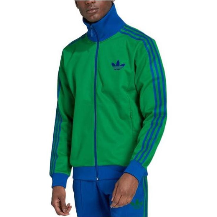 IB3426 Sporty Green Track Jacket With Ribbed Cuffs, Green Sporty Track Jacket With Ribbed Cuffs, Green Athleisure Outerwear With Ribbed Cuffs, Adidas Moisture-wicking Track Jacket For Streetwear, Adidas Sporty Track Jacket With Logo, Adidas Technical Track Jacket For Streetwear, Sporty Adidas Track Jacket, Adidas Logo Outerwear For Sports Season, Adidas Logo Winter Track Jacket For Sports Events