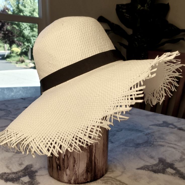 This Hat Is So Adorable! Square Woven With Frayed Edges! Ribbon Decorates Inner Circumference. 17" Brim To Brim. 7" Head Round. White Fedora Sun Hat, Casual Style, White Fedora Sun Hat For Casual Wear, White Casual Fedora Sun Hat, Casual White Fedora Sun Hat, Casual White Flat Brim Fedora, White Brimmed Panama Hat, White Adjustable Casual Straw Hat, Trendy White Fedora Straw Hat, White Adjustable Panama Hat Casual Style