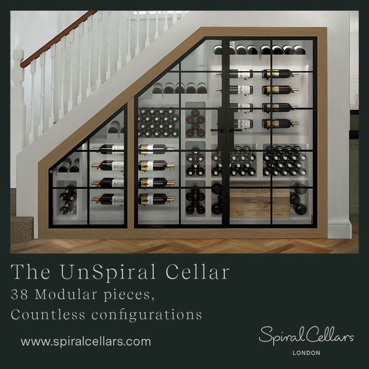 a display case filled with wine bottles next to a stair case that has the words, the unspiral cellar 38 modular pieces countless configurations