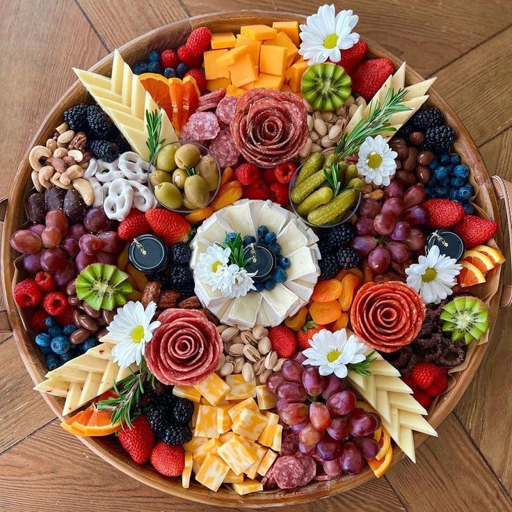 a bowl filled with lots of different types of fruit and veggies