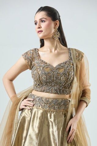 Antique gold can can attached panelled lehenga featuring embroidered floral waistband. Comes with bead sequin embellished padded blouse and dupatta. - Aza Fashions Gold Embroidered Saree Set, Gold Anarkali-style Pre-draped Saree Embellished, Gold Embellished Anarkali Pre-draped Saree, Gold Embellished Pre-draped Saree, Gold Pre-draped Saree For Wedding And Navratri, Gold Fitted Sharara For Designer Wear, Gold Fitted Designer Sharara, Gold Embellished Sets For Diwali, Gold Fitted Pre-draped Saree For Reception