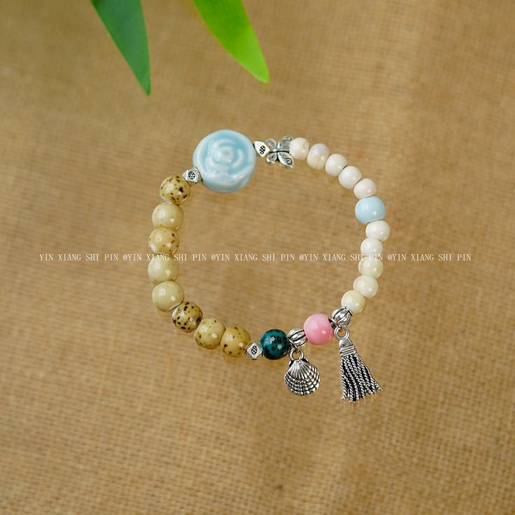 Material: Alloy Style: Ethnic Style Bohemian Beige Bracelet For Festivals, Beige Bohemian Beaded Bracelets, Bohemian Beige Beaded Bracelets For Gifts, Bohemian Beige Bracelets With Round Beads, Adjustable Bohemian Decorative Bracelets, Bohemian Decorative Bangle Bracelets, Beige Bohemian Jewelry, Beige Festival Jewelry With Colorful Beads, Beige Jewelry With Colorful Beads For Festivals