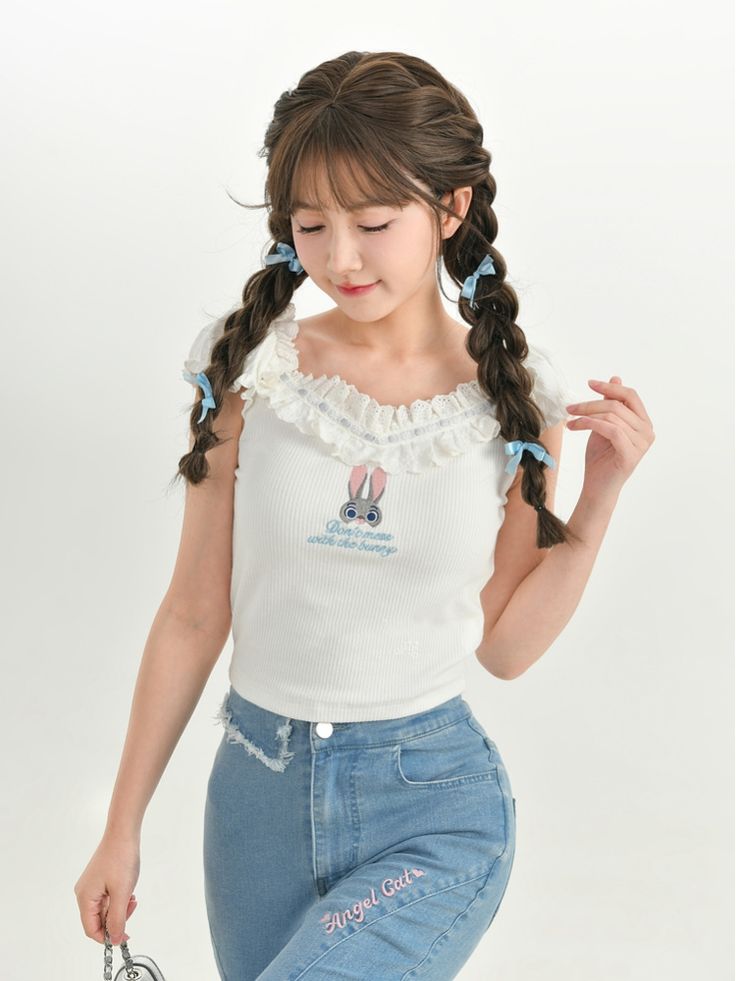 This charming top features a delightful Judy embroidery from the popular movie Zootopia, adding a touch of whimsy to your outfit. The delicate lace collar adds a sweet and feminine touch, perfect for adding a hint of romance to your look. This top is a versatile piece that can be paired with a variety of bottoms to create different looks.   Please note that this product includes only the top, other items shown are for styling purposes and can be purchased separately.  Garment Size   	 		 			Size 			S 			M 			L 		 		 			Full Length 			31 			32 			33 		 		 			Bust 			73 			77 			81 		 		 			Sleeve Length 			13 			13 			13 		 		 			Hem Circumference 			60.5 			64.5 			68.5 Spring Tops With Lace Trim And Cute Collar, Cute White Top With Lace Collar, Cute White Tops With Lace Collar, Cute Top With Ruffled Collar, Spring Doll Collar Tops With Lace Trim, Spring Cute Tops With Ruffled Collar, Cute Spring Tops With Ruffled Collar, Cute Cotton Top With Ruffled Collar, Cute Cotton Tops With Ruffled Collar