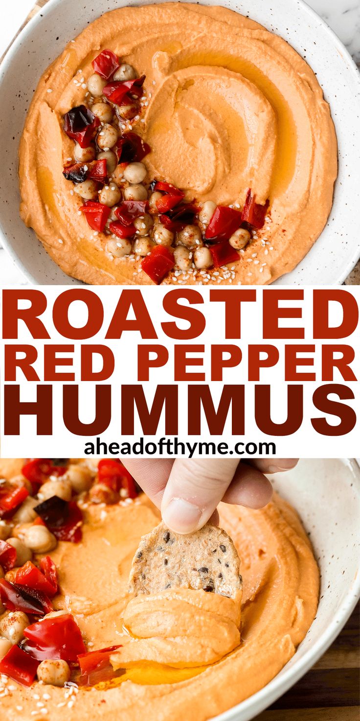 roasted red pepper hummus in a white bowl with a hand dipping them into the dip