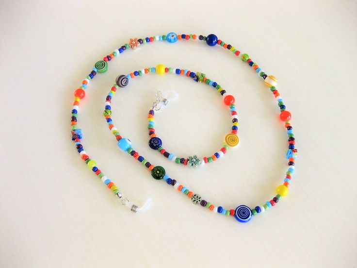 "Colorful and fun Beaded Eyeglass Chain, and Necklace combination handmade by Ralston Originals. This is a unique original style Eyeglass Chain and Necklace combination designed by Ralston Originals. Unique from any other Eyeglass Chains on Etsy, Ralston Originals was the first to add the lobster clasp at the end of the chain to join together to make a Necklace. Brilliant! This makes it even more unique because you now have two pieces of jewelry in one!!. Wear it to work or out shopping as a Nec Colorful Adjustable Glass Beaded Necklaces, Handmade Colorful Glass Beaded Necklaces, Colorful Handmade Glass Beaded Necklaces, Multicolor Handmade Glass Beads, Handmade Round Glass Beads, Handmade Multicolor Recycled Glass Beads, Handmade Glass Beads For Gifts, Gift Glasses Chains With Colorful Glass Beads, Glass Glasses Chains With Colorful Beads For Gifts