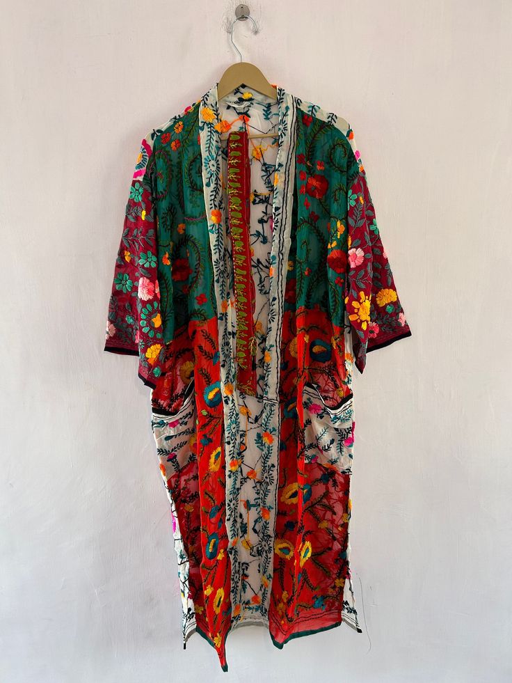 Vintage Stylish Patchwork Phulkari Handmade embroidered duster Kimono Bathroom Robe, Summer Cardigan Long Kimono Dress for Beach and Daily Night Wear   Each piece is unique, they make the perfect layer, both in summer & winter. Hand-embroidered using colourful wool, these dusters are a beautiful addition to your wardrobe Use as Dressing Gown, Bikini Cover Up , Beach Wear, Lounge Wear. Summer Shirt, Summer Coat Jacket, Etc Free Size  Measurement : Length - 50 Inches Front  - 44 Inches  Fabric: ha Silk Kimono With Patchwork, Silk Patchwork Long Sleeve Kimono, Silk Long Sleeve Kimono With Patchwork, Long Sleeve Silk Kimono With Patchwork, Bohemian Long Sleeve Patchwork Robe, Bohemian Long Patchwork Kimono, Bohemian Long Sleeve Patchwork Kimono, Long Patchwork Kimono For Festivals, Long Patchwork Festival Kimono