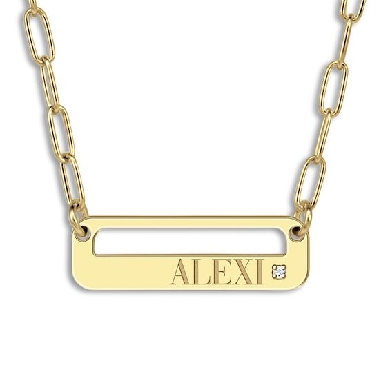 A lustrous high-polish, personalized pendant is accented with a brilliant round diamonds and displays your name proudly in the center of this stylish women's necklace. Fashioned in yellow gold-plated sterling silver, the 18-inch paperclip chain secures in place with a lobster clasp. Personalize with up to 8 characters and one line of engraving. Modern Diamond Necklace With Accents As A Gift, Classic Diamond Nameplate Jewelry, Classic Gold Diamond Name Necklace, Yellow Gold Nameplate Jewelry With Diamond Accents, Luxury Nameplate Necklace With Diamond Accents, Gold Polished Nameplate Necklace, Classic Engraved Diamond Necklace, Classic Personalized White Gold Diamond Necklace, Personalized Nameplate Jewelry With Polished Finish