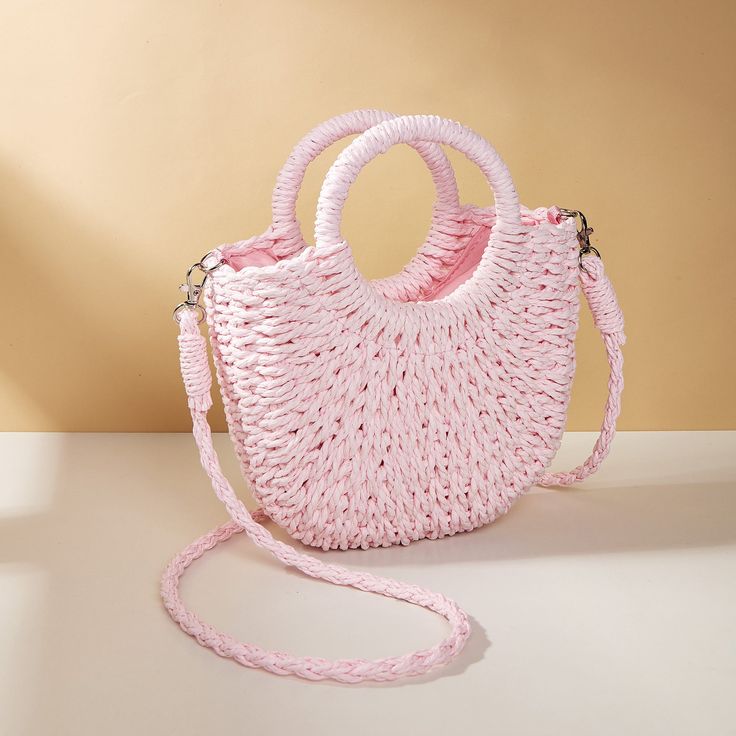 Elevate Your Summer Style Add a touch of elegance to your beach ensemble with our Stylish Straw Crossbody Bag! Crafted from high-quality straw and featuring a luxurious braided design, this handbag is both fashionable and functional, making it a must-have accessory for the modern woman. Product Features High-Quality Snap Button for Easy and Secure Closure Multi-Layer Design for Ample Storage Space Smooth Zipper for Effortless Opening and Closing Classic and Simple Style for Versatility Adjustable Shoulder Strap for Comfortable Wear Product Benefits Perfect for Summer Beach Trips and Outdoor Events Spacious Interior to Carry Your Essentials Durable Construction for Long-Lasting Use Timeless Design to Complement Any Outfit Convenient Crossbody Style for Hands-Free Convenience Your Summer Ess Trendy Braided Bag For Vacation, Trendy Braided Straw Shoulder Bag, Trendy Braided Bags For Summer, Spring Braided Shoulder Bag With Double Handle, Trendy Braided Beach Bag For Spring, Spring Braided Double Handle Shoulder Bag, Pink Shoulder Bag For Summer, Trendy Braided Straw Bag For Spring, Trendy Braided Shoulder Bag For Summer