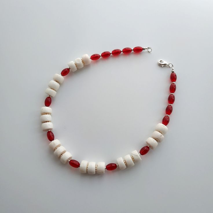 < One strand white coral and glass beaded necklace> The coral is natural, from the bottom of the Pacific Ocean. The clasp is made from metal. > Necklace length - 38 cm (14,9 in) > Necklace weight - 41 grams White Jewelry With Oval Wooden Beads, White Handmade Necklaces With Oval Beads, Handmade White Necklaces With Oval Beads, Red Polished Bead Necklaces For Beach, Handmade Red Coral Jewelry For The Beach, Red Polished Beads Necklace For Beach, Red Coral Necklaces For Beach, White Wooden Beaded Necklaces For Beach, White Wooden Beads Necklace For Gift