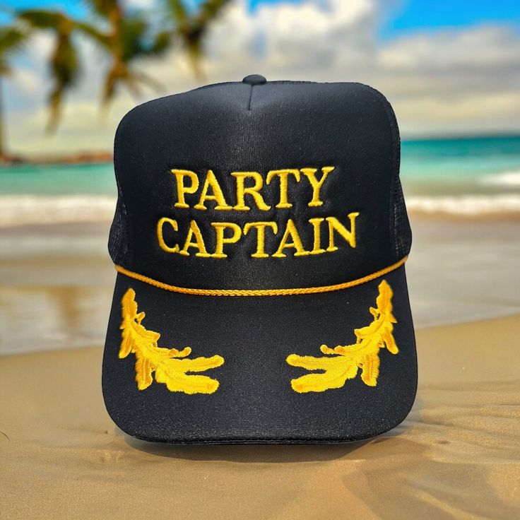 PARTY CAPTIAN embroidered on a black with gold leaf Otto Foam High-Profile Trucker Hat. *Message us if you are looking for a different color hat or thread or with any other questions. *Saying can be customized. Please message us before ordering.  Hat Description:  The Traditional Look 5-panel cap Seamless Foam Front Panel with Lining Matching Color Braid Visor Matching Fabric Undervisor, Adjustable Snapback SHAPE: High-Profile FABRIC:  100% Polyester Front,  Mesh Back VISOR: Pre-curved FIT & SIZ Novelty Mini Hats With Curved Brim For Party, Novelty Mini Hat With Curved Brim For Party, Novelty Party Hats With Short Brim, Novelty Costume Hat With Short Brim For Parties, Novelty Mini Cap Hats For Party, Novelty Summer Party Hats, Black Snapback Mini Hats For Party, Carnival Party Costume Cap, Black Trucker Hat For Party With Curved Brim