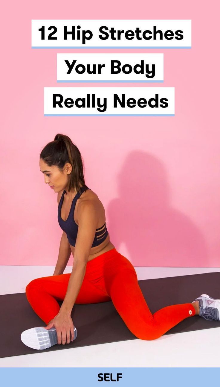 a woman in red leggings is doing exercises with her feet on the ground