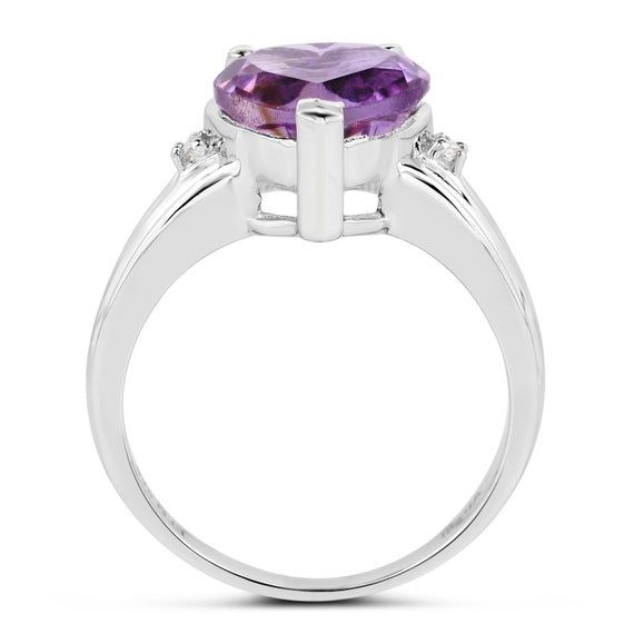 Amethyst Ring, Amethyst Heart Silver Ring, Natural Amethyst Ring for Women, February Birthstone RingFlaunt yourself with this amethyst & white topaz cocktail ring. The natural gemstones have a combined weight of 3.03  carats and are set in .925 sterling silver with rhodium plating. The purple hue of this ring adds a pop of color to any look!  The understated design and vibrant stones make this ring perfect for every occasion.amethyst cocktail ring, amethyst ring, amethyst silver ring, natura Amethyst Birthstone Promise Ring With Gemstone Accents, Amethyst Ring With Gemstone Accents For Anniversary, Amethyst Diamond Ring With Gemstone Accents For Promise, Heart Cut Amethyst Jewelry With Center Stone, Heart Cut Amethyst Ring With Accent Stones, Purple Round Stone Promise Ring, Amethyst Gemstone Heart Ring For Wedding, Purple Gemstone Heart Ring For Promise, Purple Gemstone Heart Promise Ring