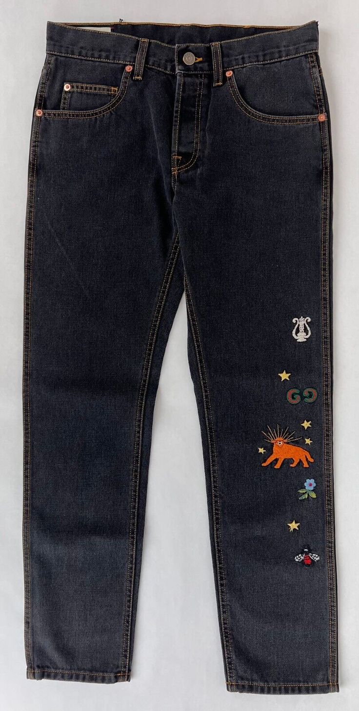 Blue Gucci Denim Bottoms, Gucci Casual Cotton Jeans, Casual Gucci Pants With Pockets, Gucci Straight Leg Bottoms With Five Pockets, Gucci Casual Blue Jeans, Casual Blue Gucci Jeans, Gucci Blue Straight Leg Jeans, Gucci Straight Leg Jeans With Five Pockets, Gucci Fitted Straight Leg Bottoms