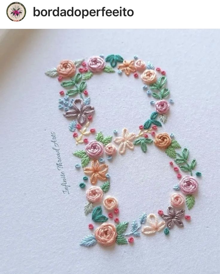 the letter b is made up of flowers and leaves on white paper with text that reads borda do perfettoo