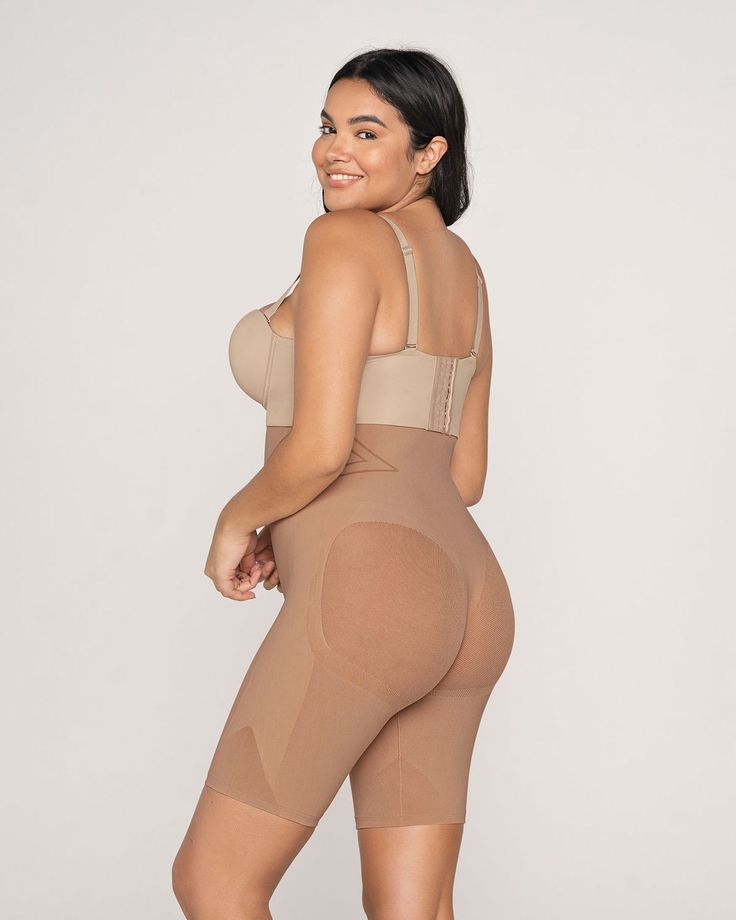 Slip into seamless shaping! This shaper short is made of our signature SkinFuse® fabric for moderate compression to shape your entire torso. Sheer mesh cutouts and a thong effect in the back offer a natural butt lift without flattening. Special seams create an hourglass effect. This shaper comes with straps, but you can also wear it strapless. Features an open bust, “wear your own bra” design. You can wear this shaper under dresses and skirts to prevent chafing, or under pants and trousers for s Bra Design, Waist Shapewear, Open Bust, Slip Shorts, Under Pants, Everyday Bra, Under Dress, Body Shapers, Two Piece Pant Set