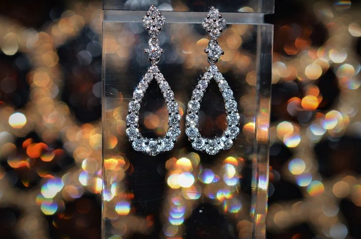 A ladies pair of stunning 18 karat white gold diamond teardrop shape dangle earrings set with 42 round brilliant cut diamonds having a total weight of 1.75 carats. Diamond Fashion Jewelry, Diamond Fashion, Round Brilliant Cut Diamond, Brilliant Cut Diamond, Teardrop Earrings, Earrings Set, White Gold Diamonds, Round Brilliant, Earring Set