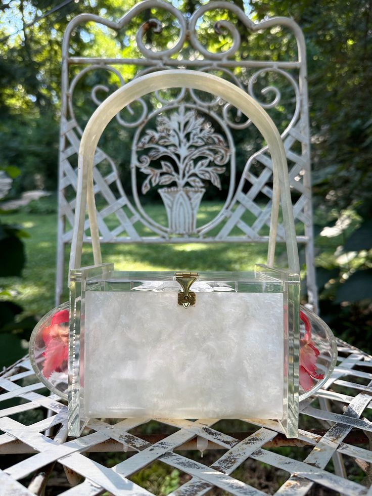 "Thank You If You Favored One of My Items! You Will Receive 10% Off an Item of Your Choice, Unless It Is On Sale, Code17. Thank You. RARE LUCITE Handbags/Lucite Bags/50's Lucite Handbags/Unique Lucite Purses/50's Handbag/Vintage Lucite PursesNear MINT Condition Circa 1950's RARE Lucite Handbag These Coffin Lucite Handbags are very Rare.  Sometimes they are called Wedding Handbags.  This one is particularly Rare because Flowers are on the Ends rather than the Top.  Most often you see them done in Retro Rectangular Evening Box Bag, Retro Rectangular Box Bag For Evenings, Vintage Rectangular Box Bag For Party, Chic Box Bag With Handle Drop For Gifts, Chic Box Bag With Handle Drop As A Gift, Vintage Square Box Bag With Detachable Handle, Vintage Square Box Bag, Vintage Handheld Box Bag With Detachable Handle, Vintage Tote Box Bag With Detachable Handle