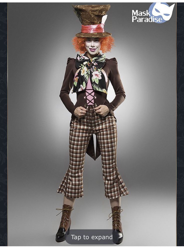 an image of a woman dressed up as the mad hatter in wonderlandland costume