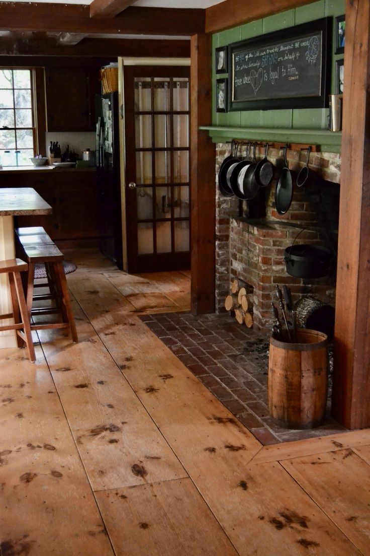 the kitchen is clean and ready for us to use in the day time, as well as cooking utensils on the fireplace